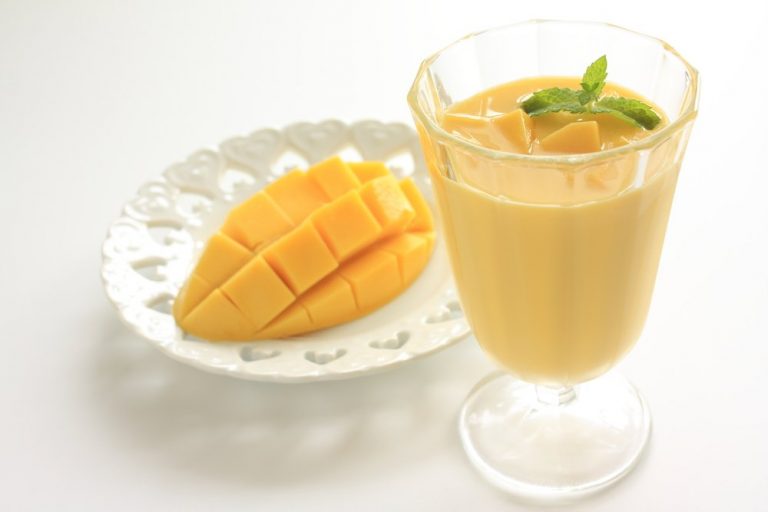 A mango flavored smoothie with mint